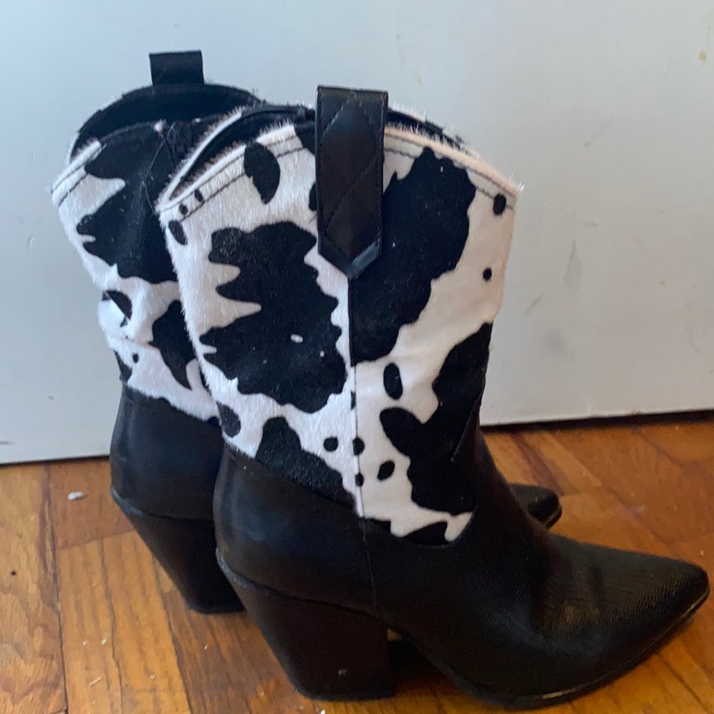 Heeled cow print boots. great for barn dances!
